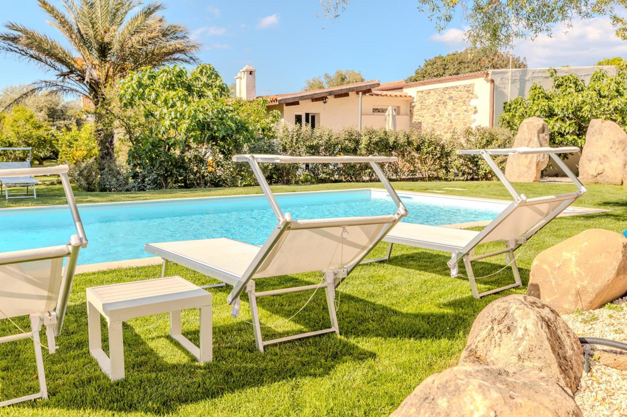 Апартаменты Stazzo San Teodoro Piscina Condivisa Экстерьер фото